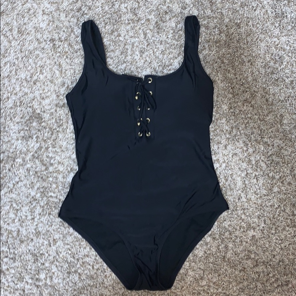 Black and gold one piece low back swim suit